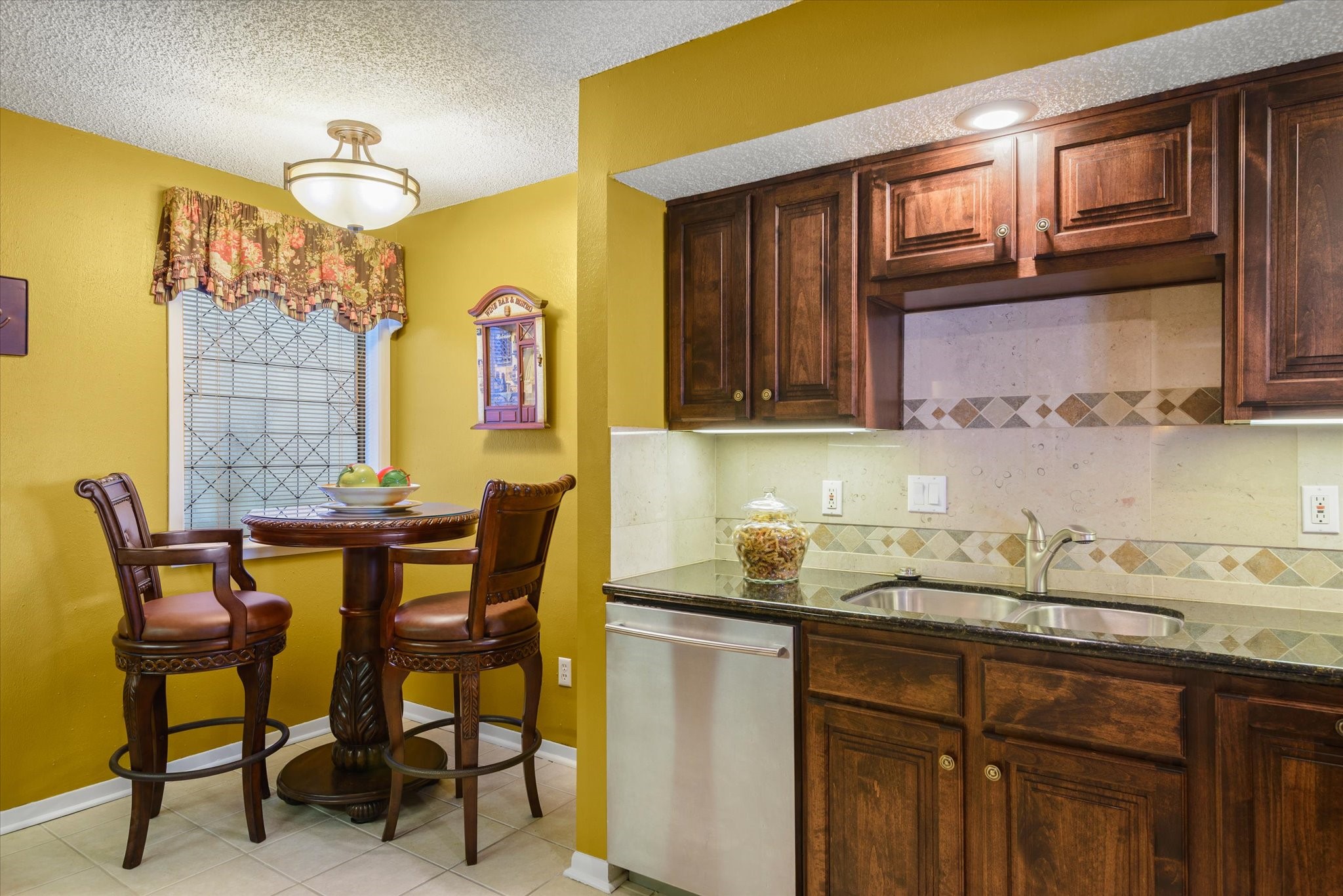 18 Antilles Lane Nassau Bay, TX 77058 - Photo 10 of 44 a kitchen with a sink cabinets and window
