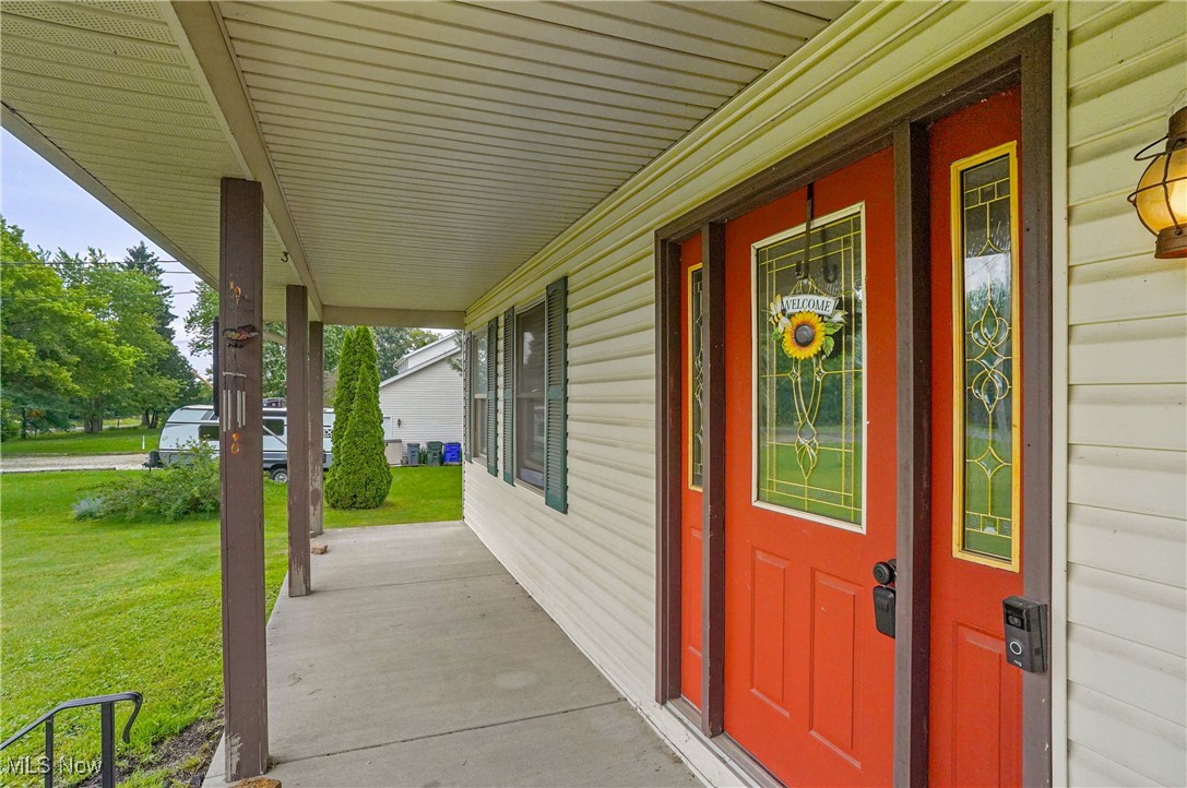 4940 Hayes Road Ravenna, OH 44266 - Photo 30 of 39 RELAX on this fantastic front porch!