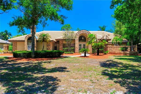 a front view of a house with a patio