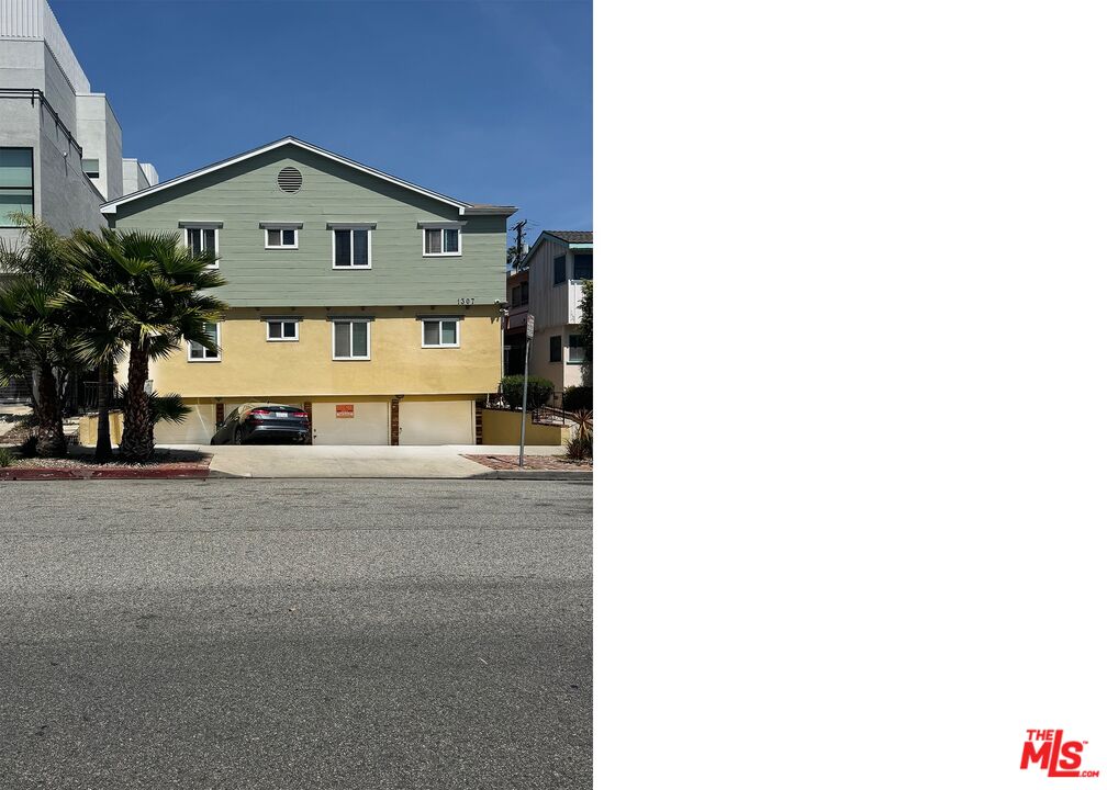 1307 15th Street Santa Monica, CA 90404 - Photo 1 of 7 a front view of a house with a yard