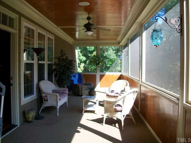 635 Chisenhall Road Angier, NC 27501 - Photo 4 of 12 Sit on screen porch and enjoy your water view.
