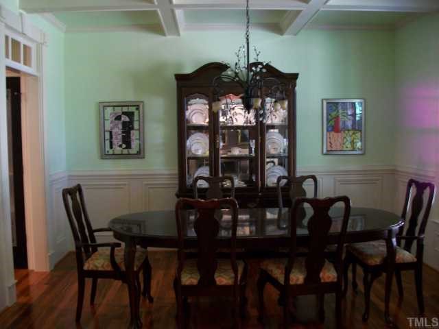 635 Chisenhall Road Angier, NC 27501 - Photo 9 of 12 Dining w/coffered ceiling, loads of trim, beautiful Tigerwood hardwood floors, tramsoms