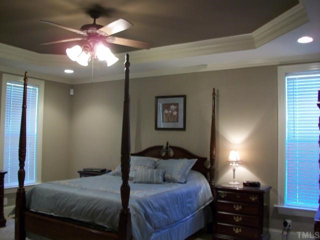 635 Chisenhall Road Angier, NC 27501 - Photo 10 of 12 Master BR w/trey ceiling, private Bath w/Tile shower, garden tub, double vanities, hims and hers WIC and much more!!!!