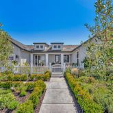 a view of house with yard