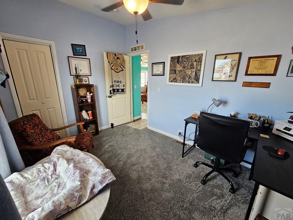 1302 Rittgers Street Eads, CO 81036 - Photo 19 of 29 a living room with furniture piano and a window