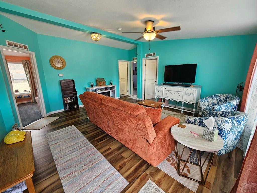 1302 Rittgers Street Eads, CO 81036 - Photo 2 of 29 a living room with furniture and a flat screen tv