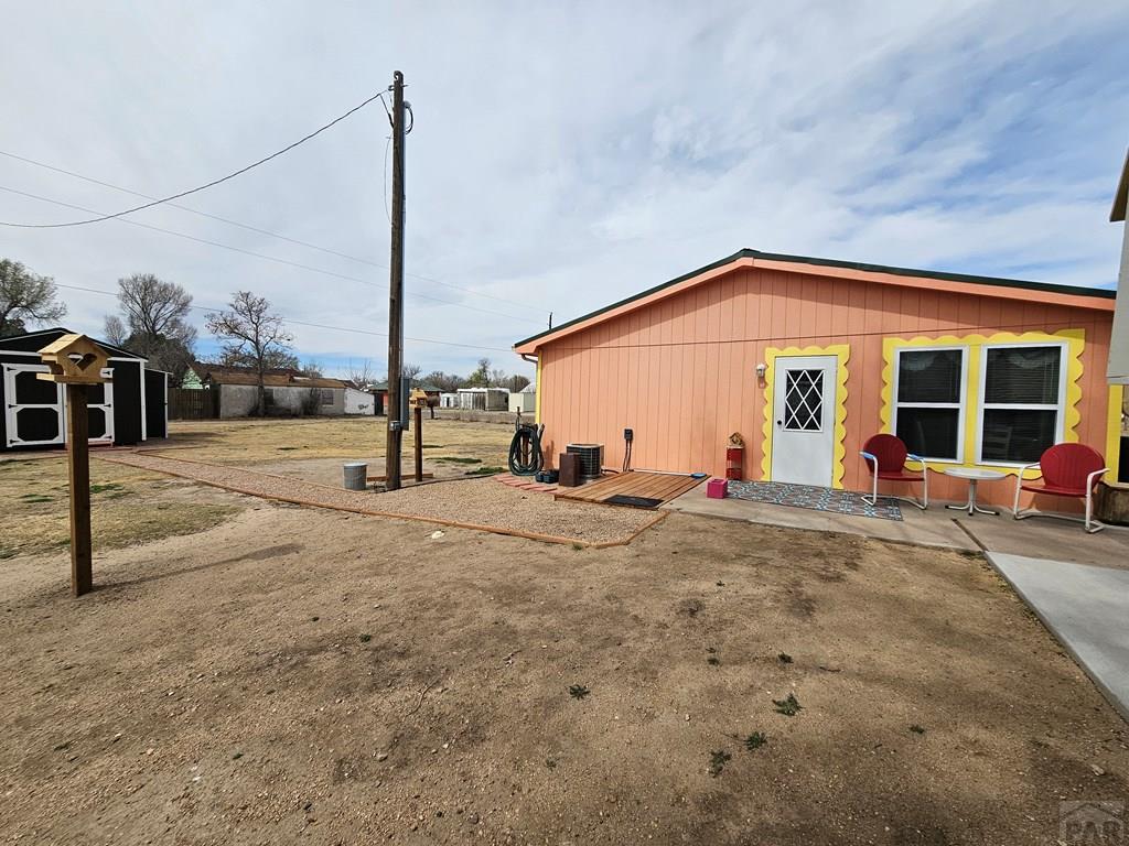 1302 Rittgers Street Eads, CO 81036 - Photo 23 of 29 a view of a house with backyard and road