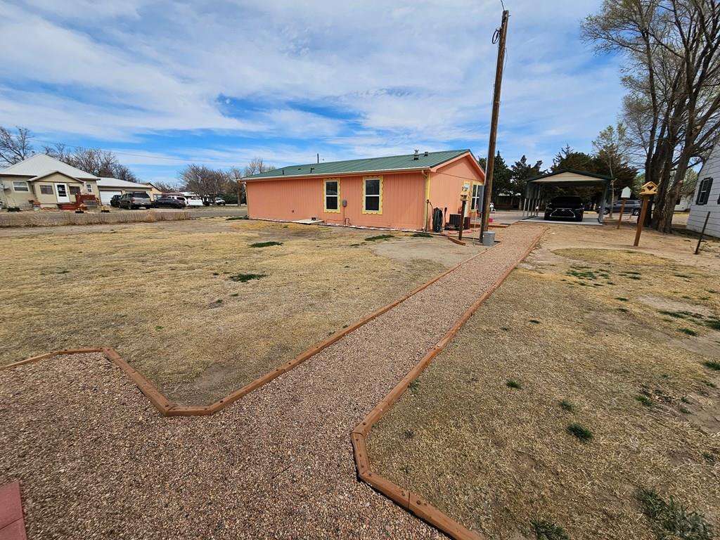1302 Rittgers Street Eads, CO 81036 - Photo 27 of 29 a front view of a house with a yard
