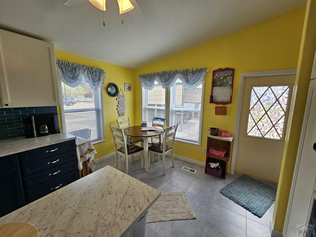 1302 Rittgers Street Eads, CO 81036 - Photo 7 of 29 a bed room with a bed and a chair