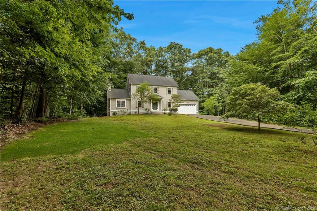 564 Old Toll Road Madison, CT 06443 - Photo 1 of 1 a front view of a house with a yard