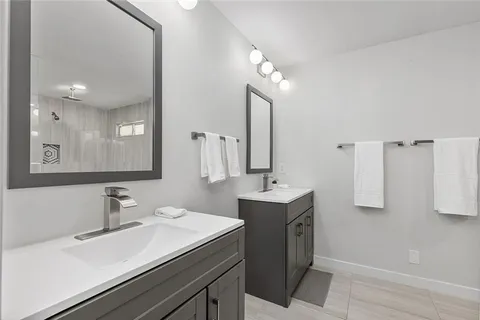 a bathroom with a shower and a toilet