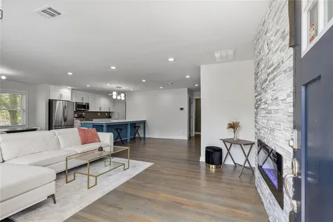 a living room with furniture and a table