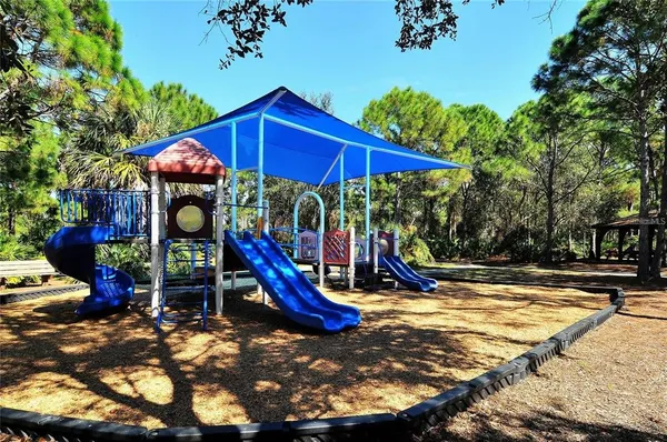 a view of a park with slide