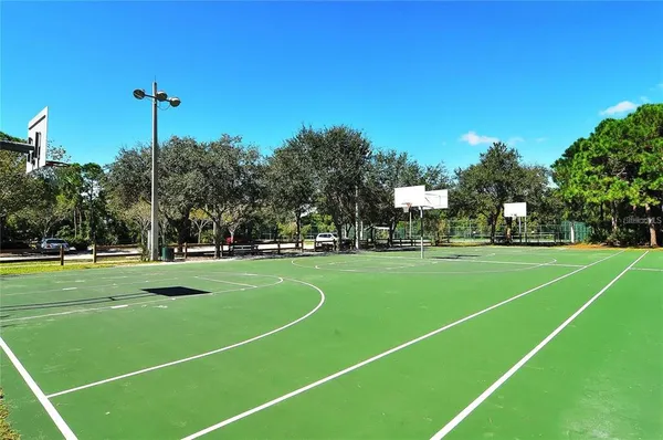 a view of a golf course with a lake