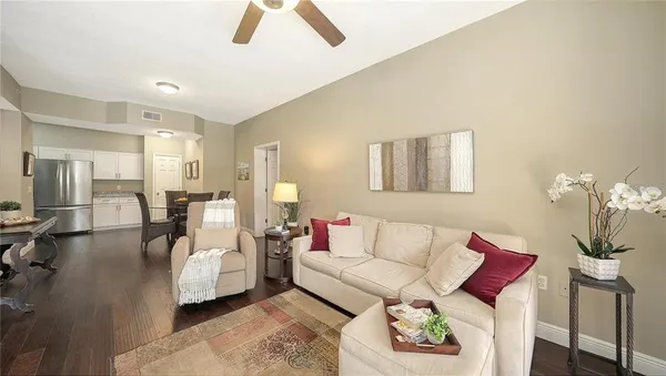a living room with furniture and a table