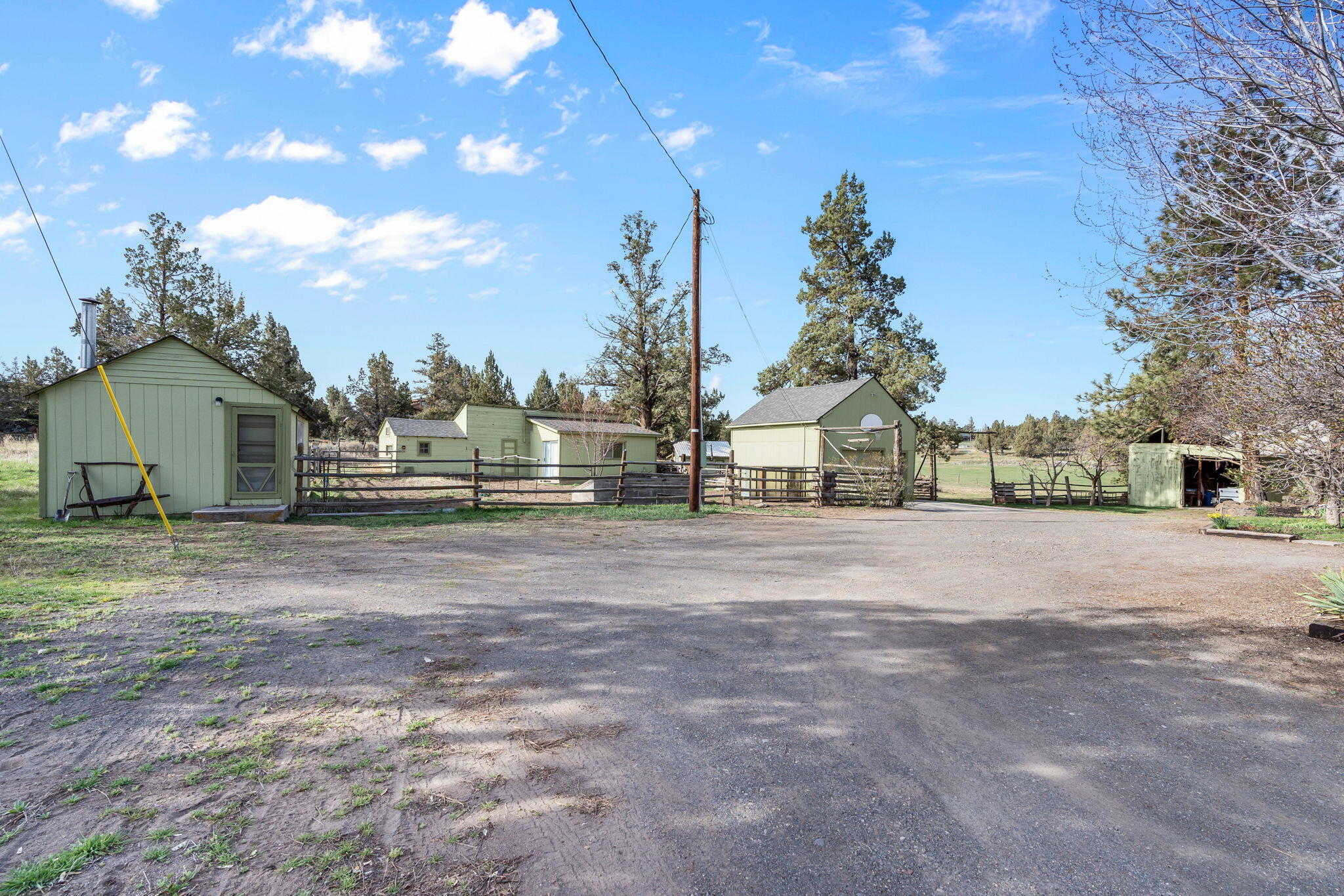 22655 Alfalfa Market Road Bend, OR 97701 - Photo 34 of 58 Open space to access all the exterior buildings