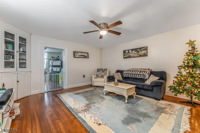 a living room with furniture and window