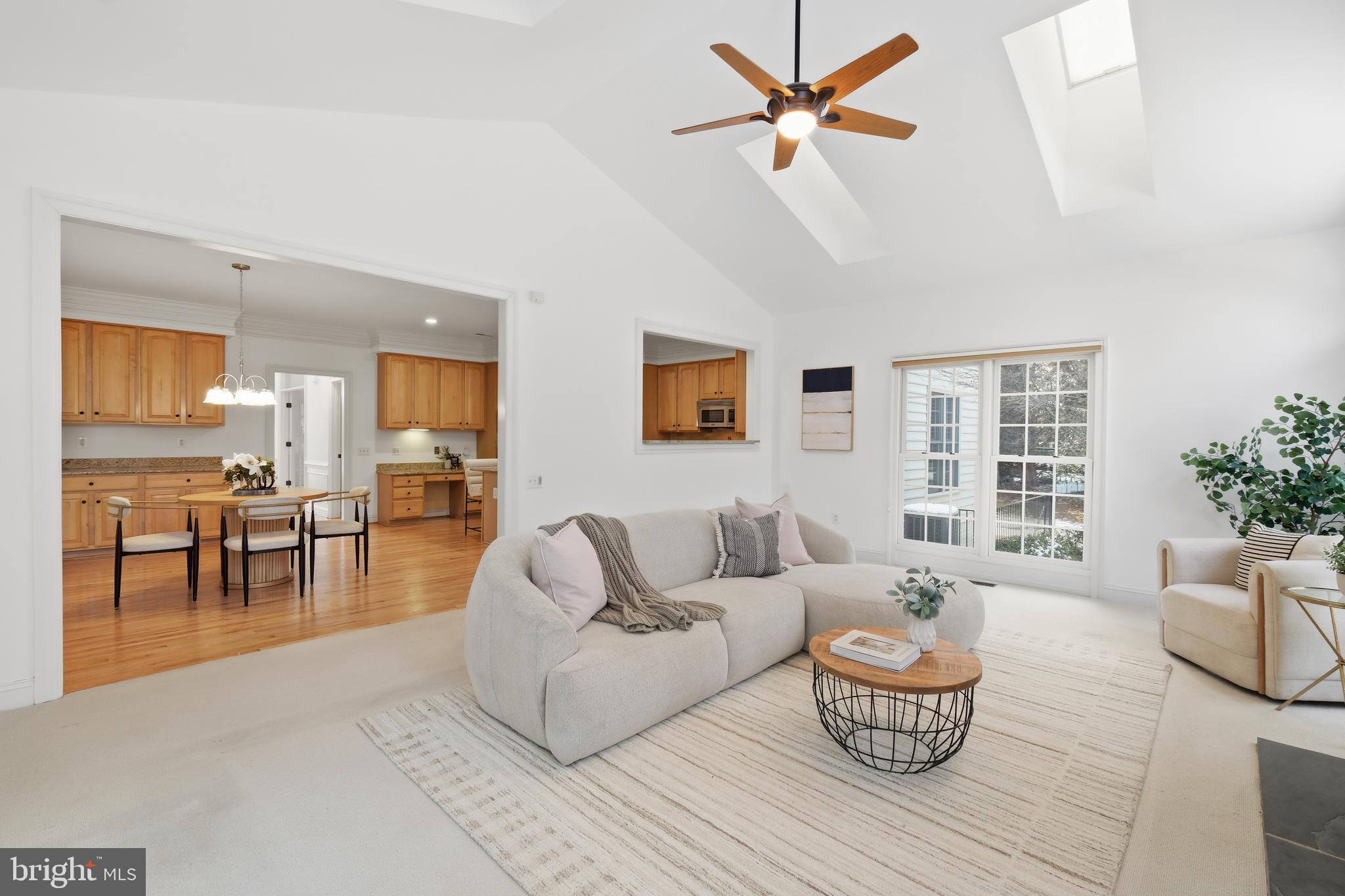 10405 Sandringham Court Potomac, MD 20854 - Photo 29 of 85 a living room with furniture and a large window