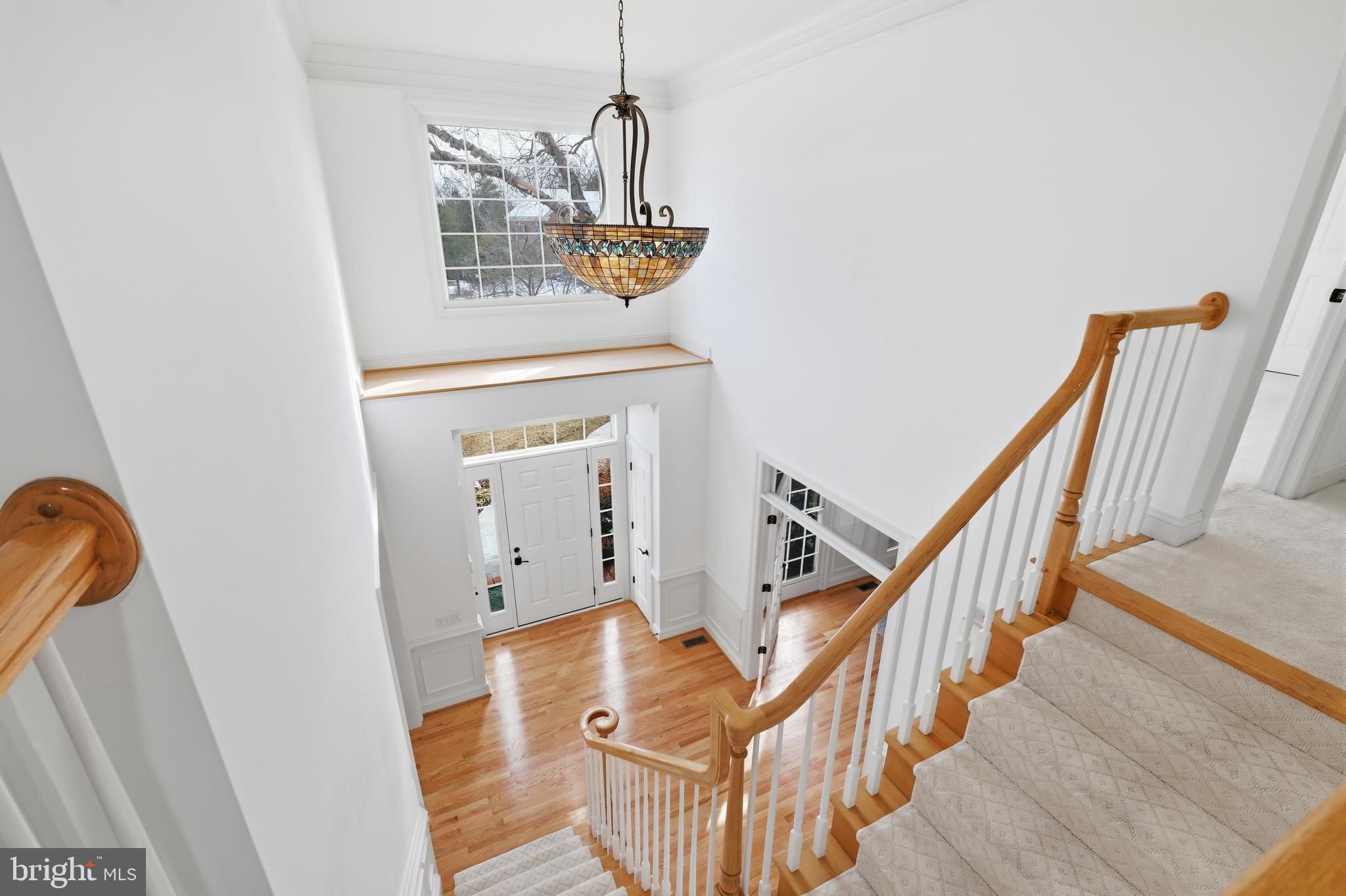 10405 Sandringham Court Potomac, MD 20854 - Photo 37 of 85 a view of entryway and hall with wooden floor