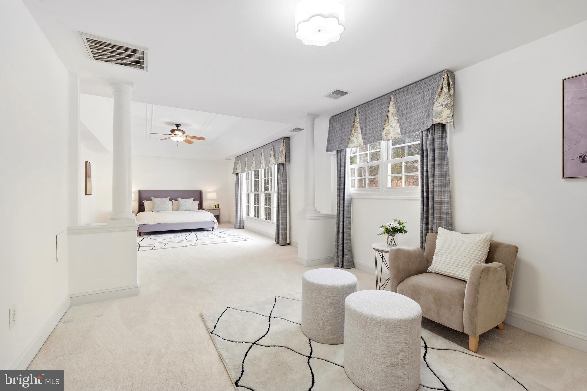 10405 Sandringham Court Potomac, MD 20854 - Photo 39 of 85 a living room with furniture and a large window