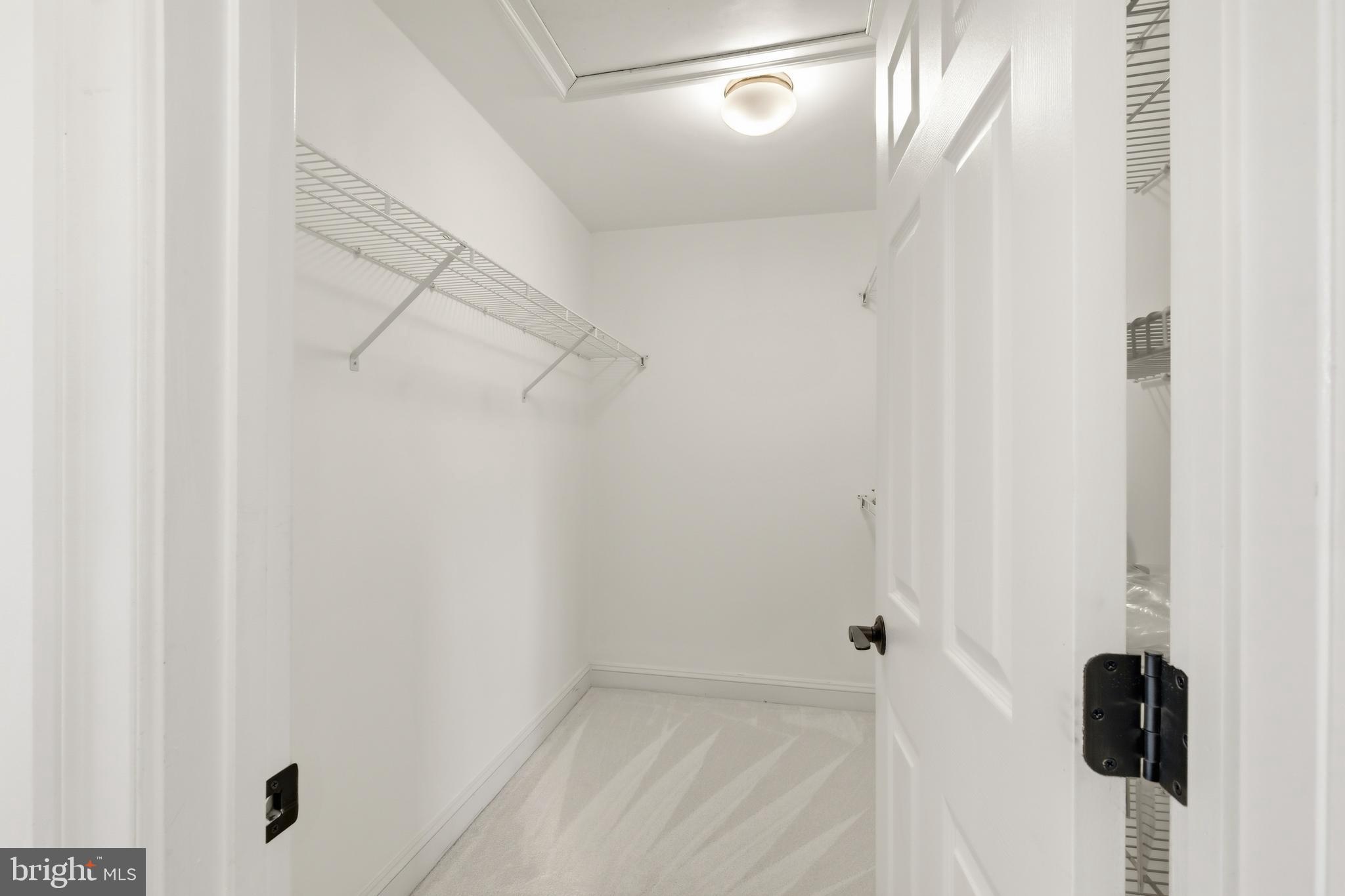 10405 Sandringham Court Potomac, MD 20854 - Photo 45 of 85 a view of a walk in closet