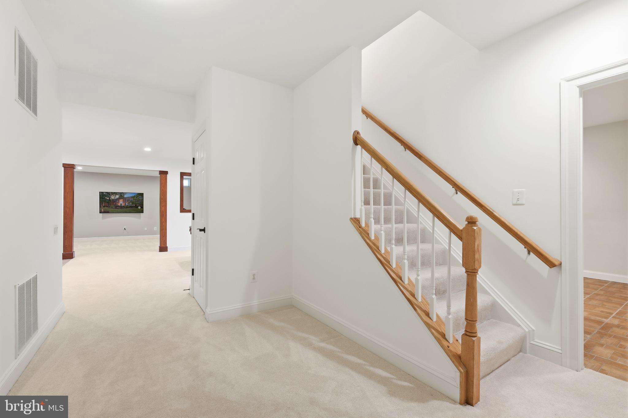 10405 Sandringham Court Potomac, MD 20854 - Photo 58 of 85 a view of an entryway with staircase