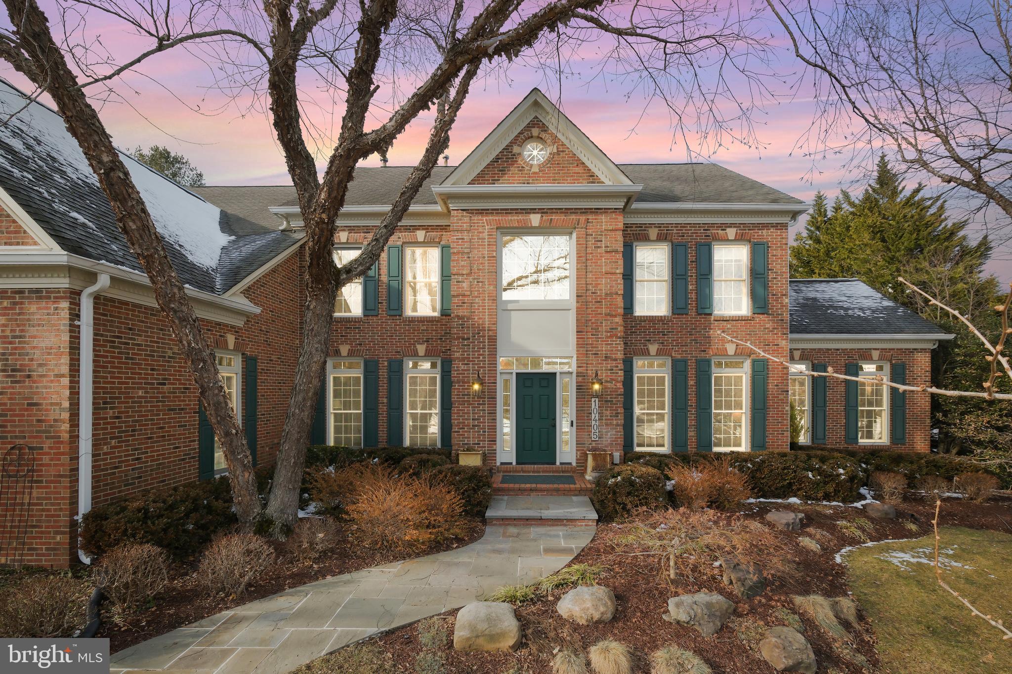 10405 Sandringham Court Potomac, MD 20854 - Photo 6 of 85 a front view of a house
