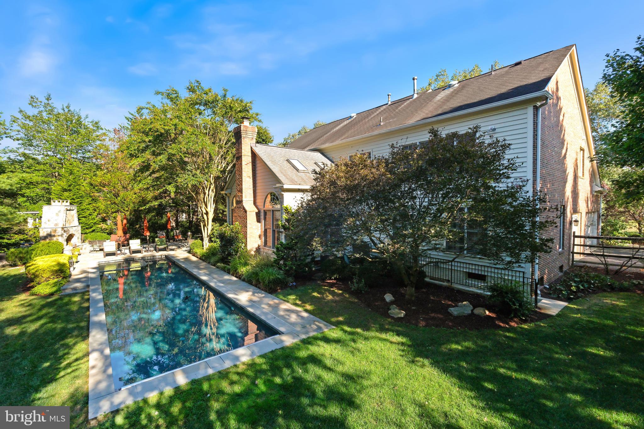 10405 Sandringham Court Potomac, MD 20854 - Photo 75 of 85 a backyard of a house with lots of green space