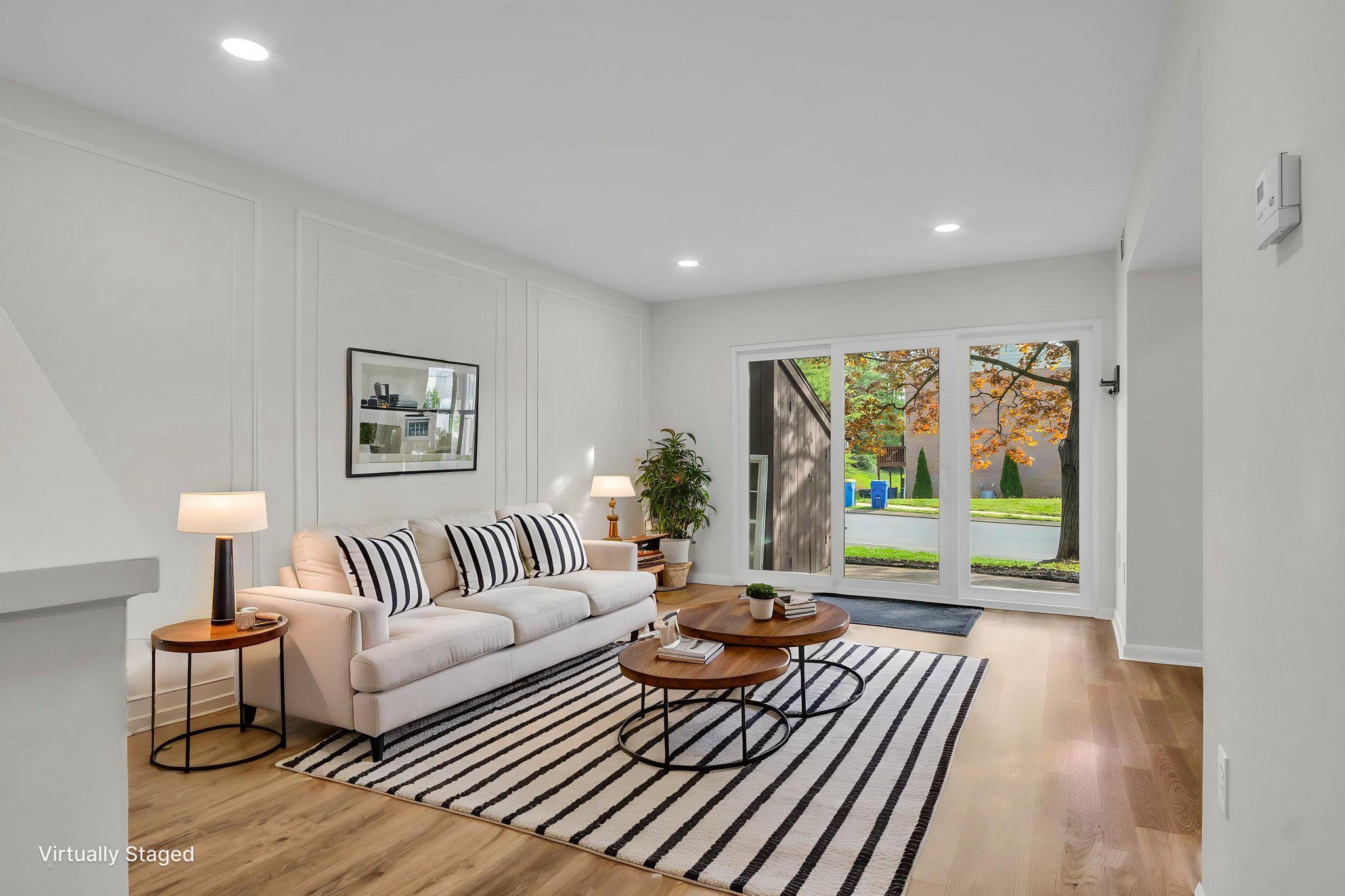 Virtually staged bright and inviting living space.
