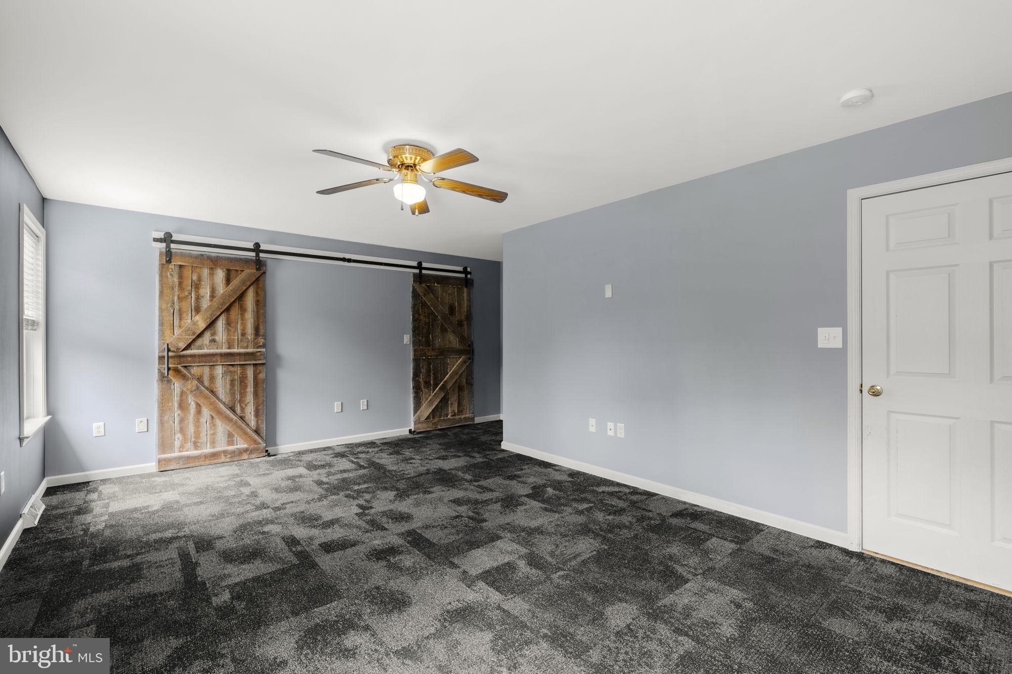 331 Brunners Grove Road Reinholds, PA 17569 - Photo 27 of 62 a view of a hallway with a chandelier