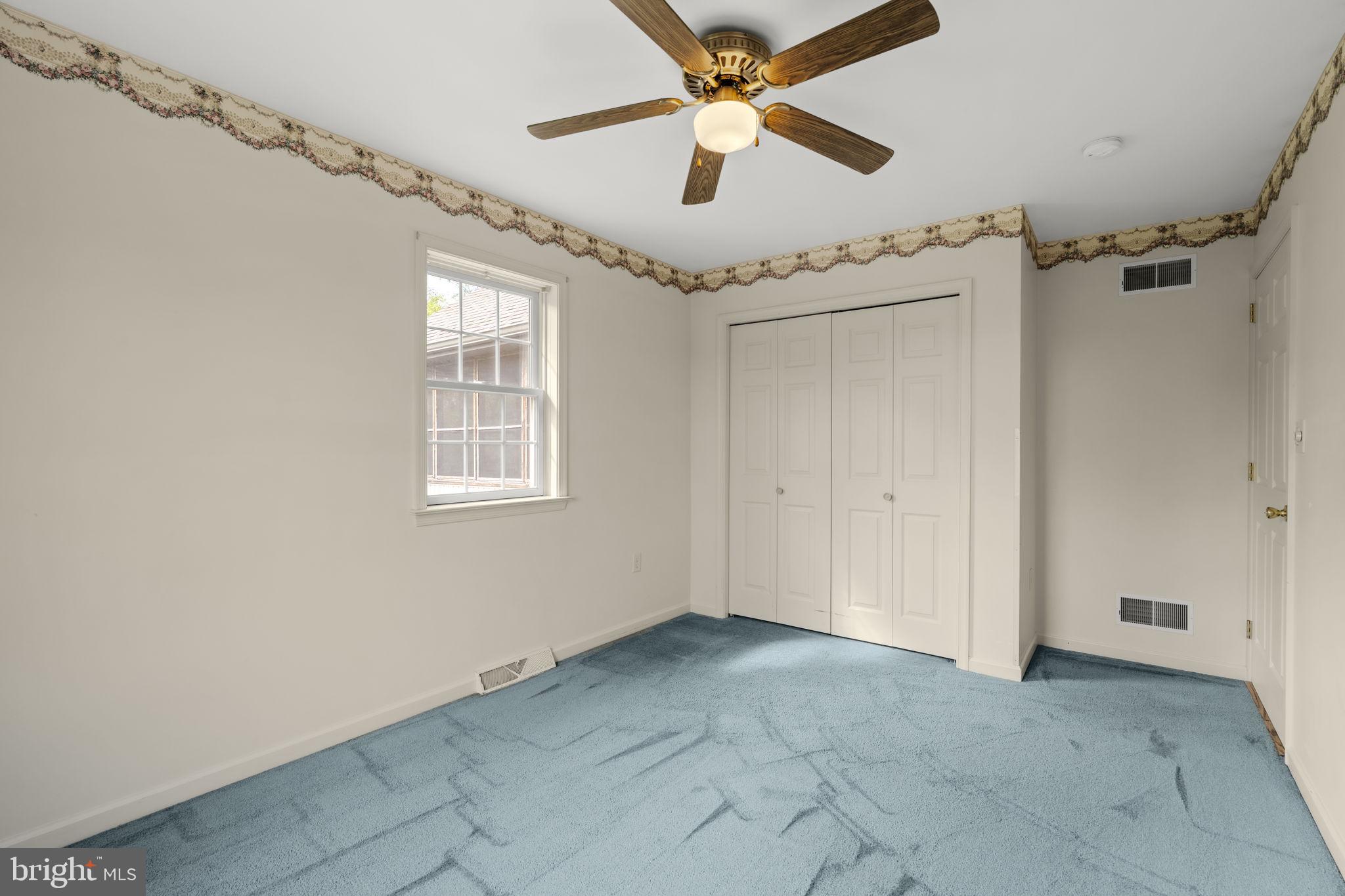 331 Brunners Grove Road Reinholds, PA 17569 - Photo 34 of 62 a view of a big room with a ceiling fan and windows