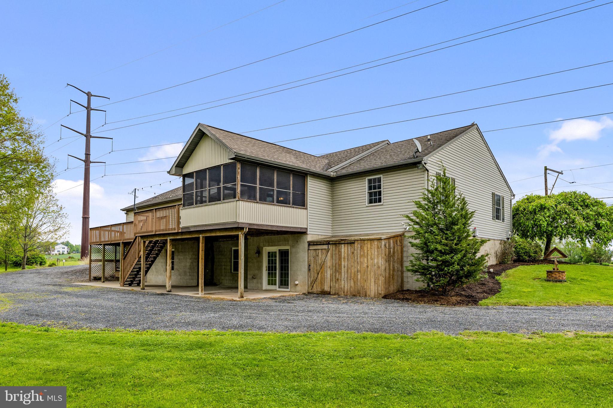 331 Brunners Grove Road Reinholds, PA 17569 - Photo 6 of 62 a front view of a house with a yard