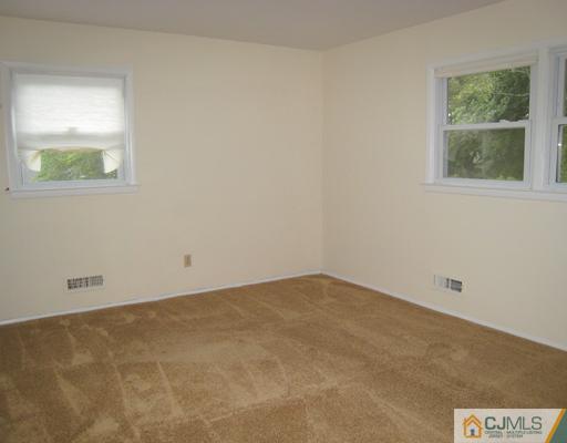 10 Gulf Road East Brunswick, NJ 08816 - Photo 17 of 25 an empty room with a window