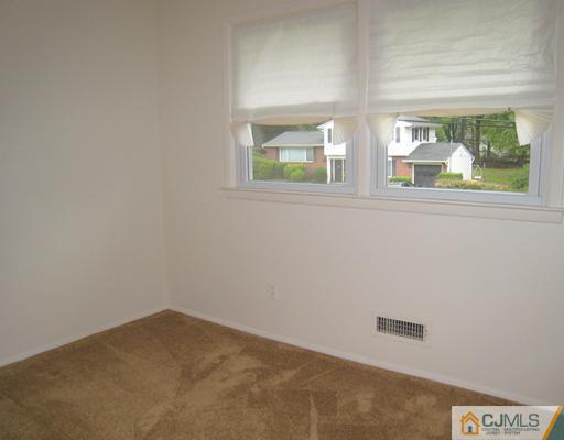 10 Gulf Road East Brunswick, NJ 08816 - Photo 19 of 25 an empty room with window