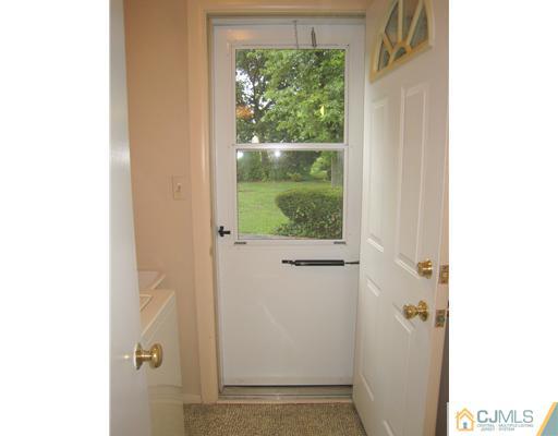 10 Gulf Road East Brunswick, NJ 08816 - Photo 22 of 25 a view of bathroom with a shower and a window