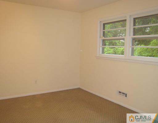 10 Gulf Road East Brunswick, NJ 08816 - Photo 25 of 25 an empty room with a window