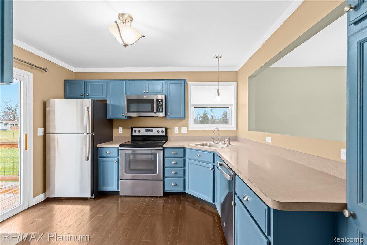 3980 Byron Road Howell, MI 48855 - Photo 25 of 47 What a fun BLUE cabinet color!
