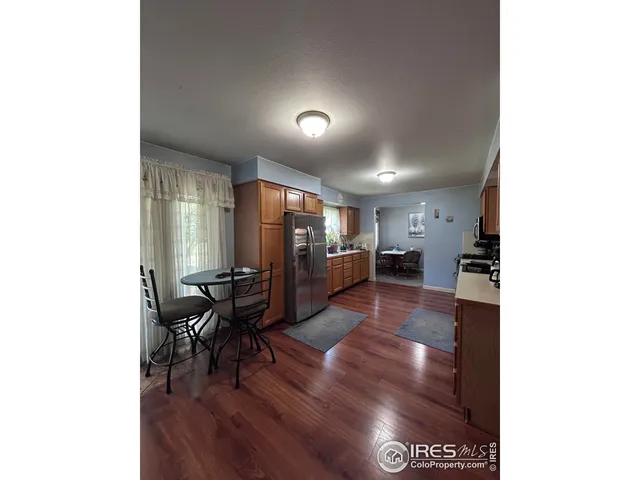 a view of a living room and dining room