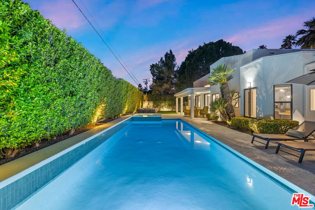 1414 Sagebrush Road Palm Springs, CA 92264 - Photo 46 of 48 a view of a house with swimming pool