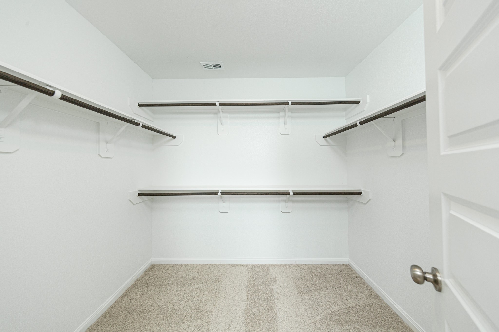 13663 Kit Run Splendora, TX 77372 - Photo 18 of 28 a view of an empty walk in closet