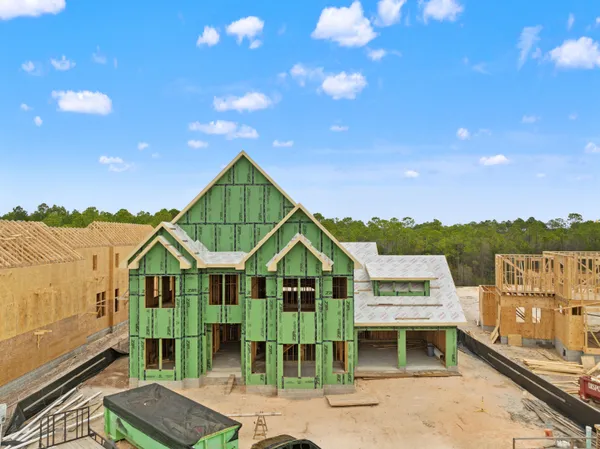 a aerial view of a house with a garden