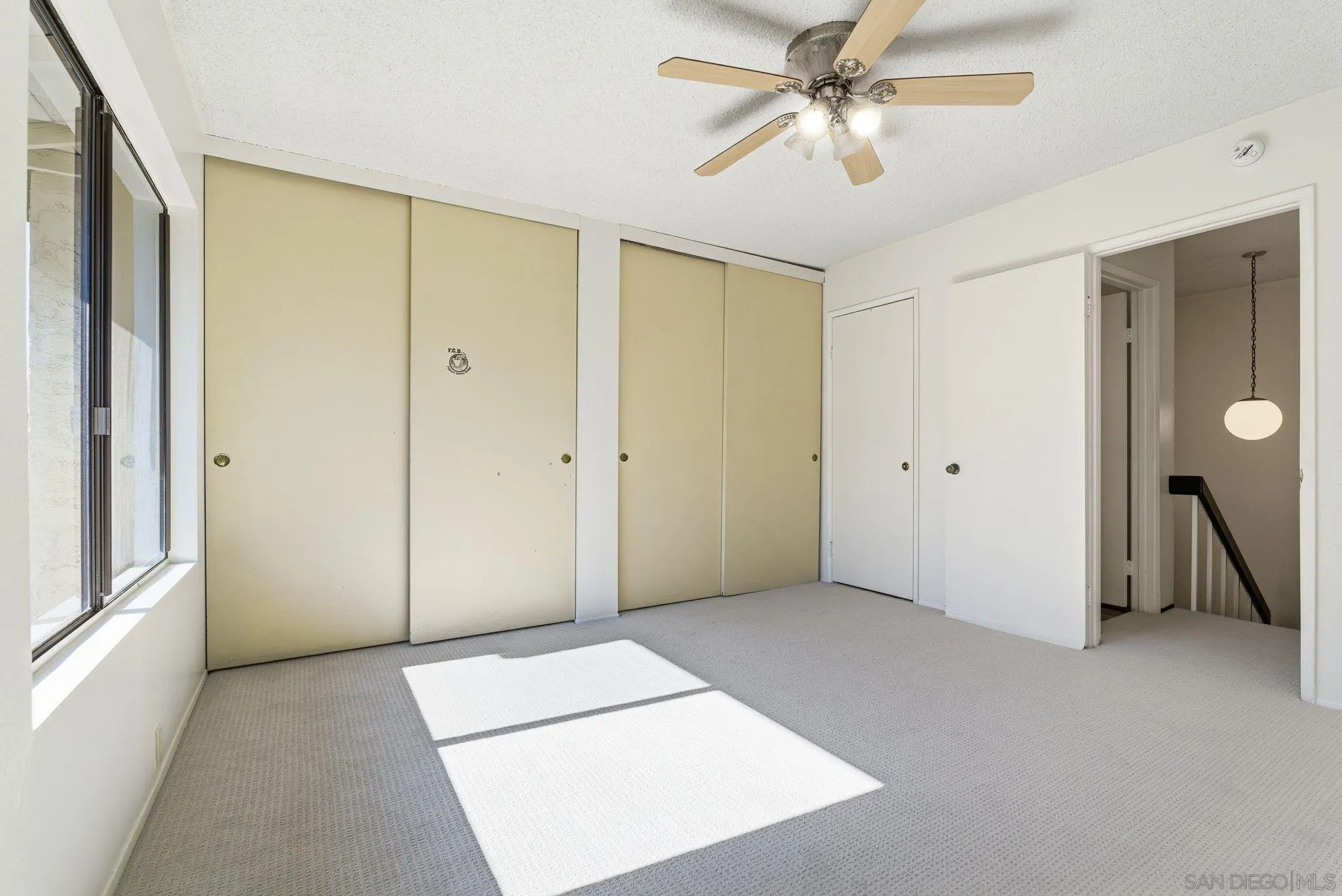 262 Rancho Drive, Unit C Chula Vista, CA 91911 - Photo 13 of 29 a view of empty room with ceiling fan