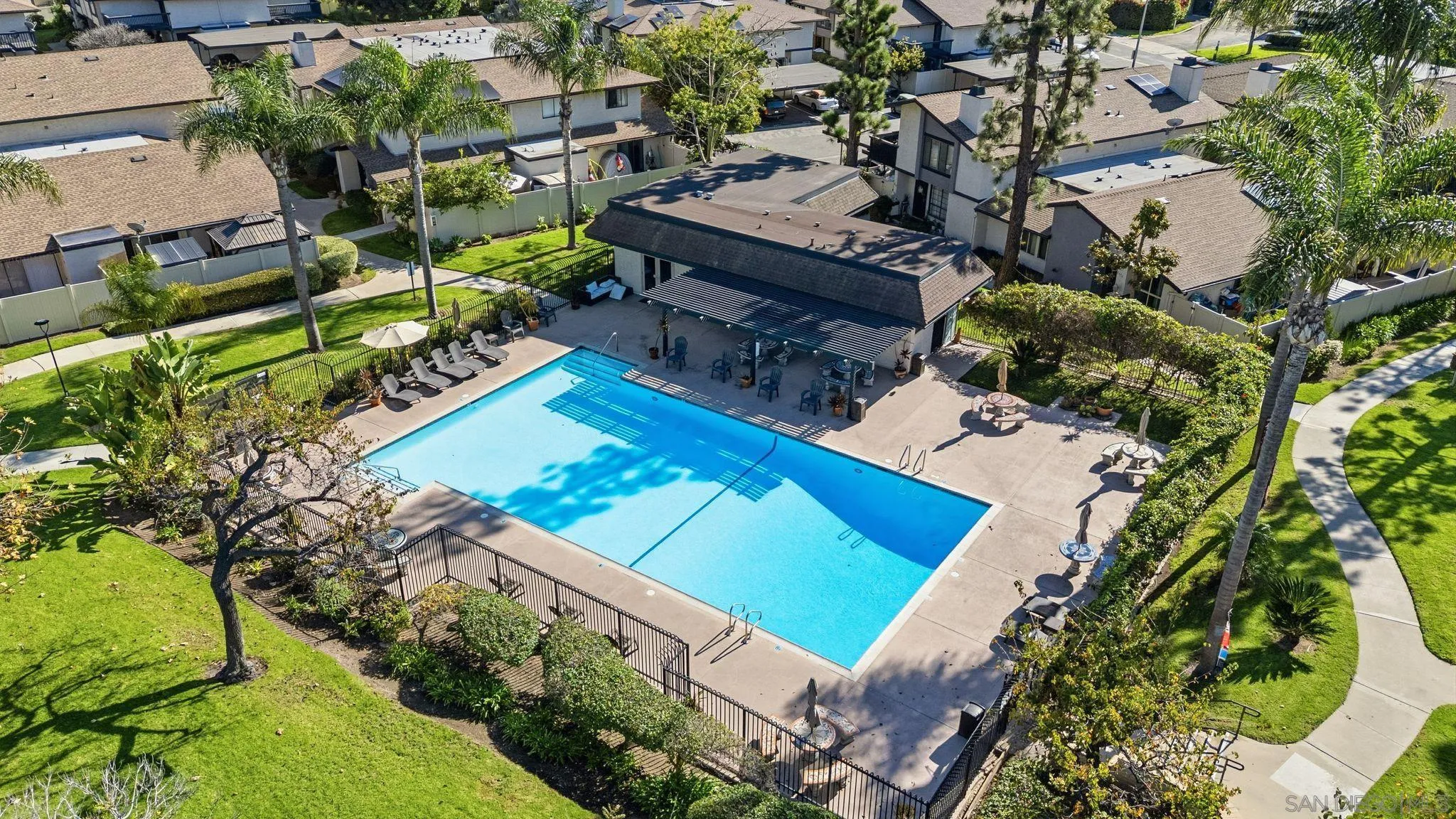 262 Rancho Drive, Unit C Chula Vista, CA 91911 - Photo 21 of 29 an aerial view of a house with a yard and lake view