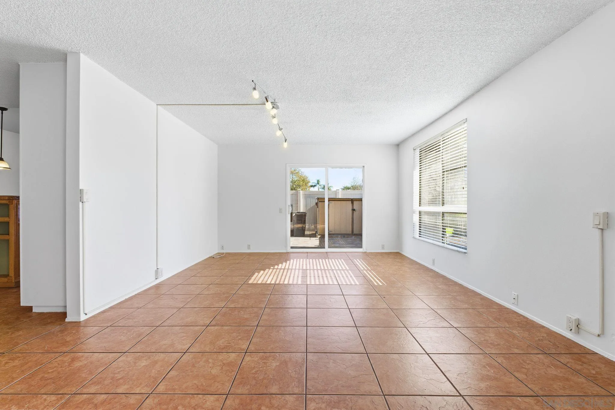 262 Rancho Drive, Unit C Chula Vista, CA 91911 - Photo 3 of 29 a view of an empty room with a window