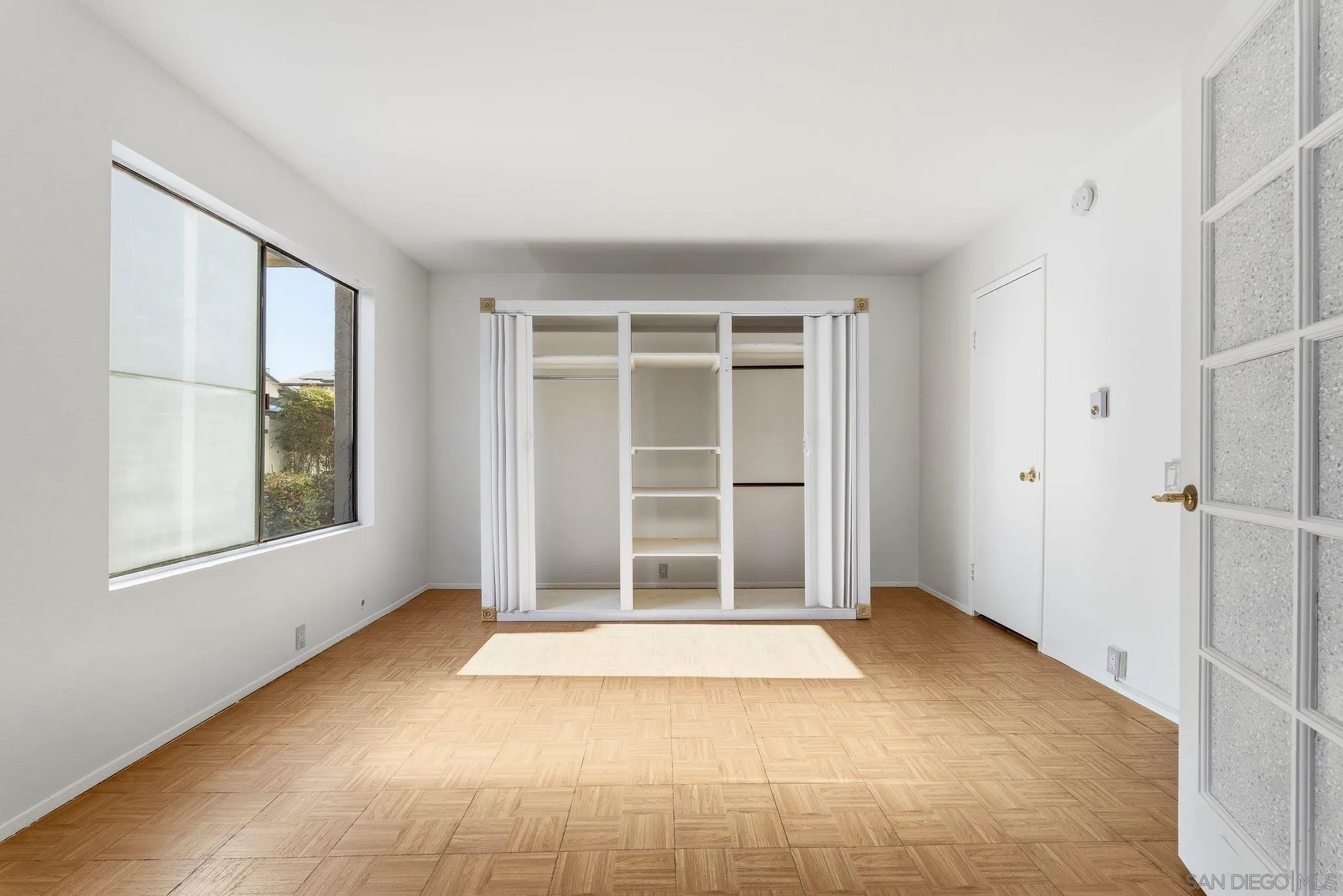 262 Rancho Drive, Unit C Chula Vista, CA 91911 - Photo 4 of 29 a view of an empty room with a window