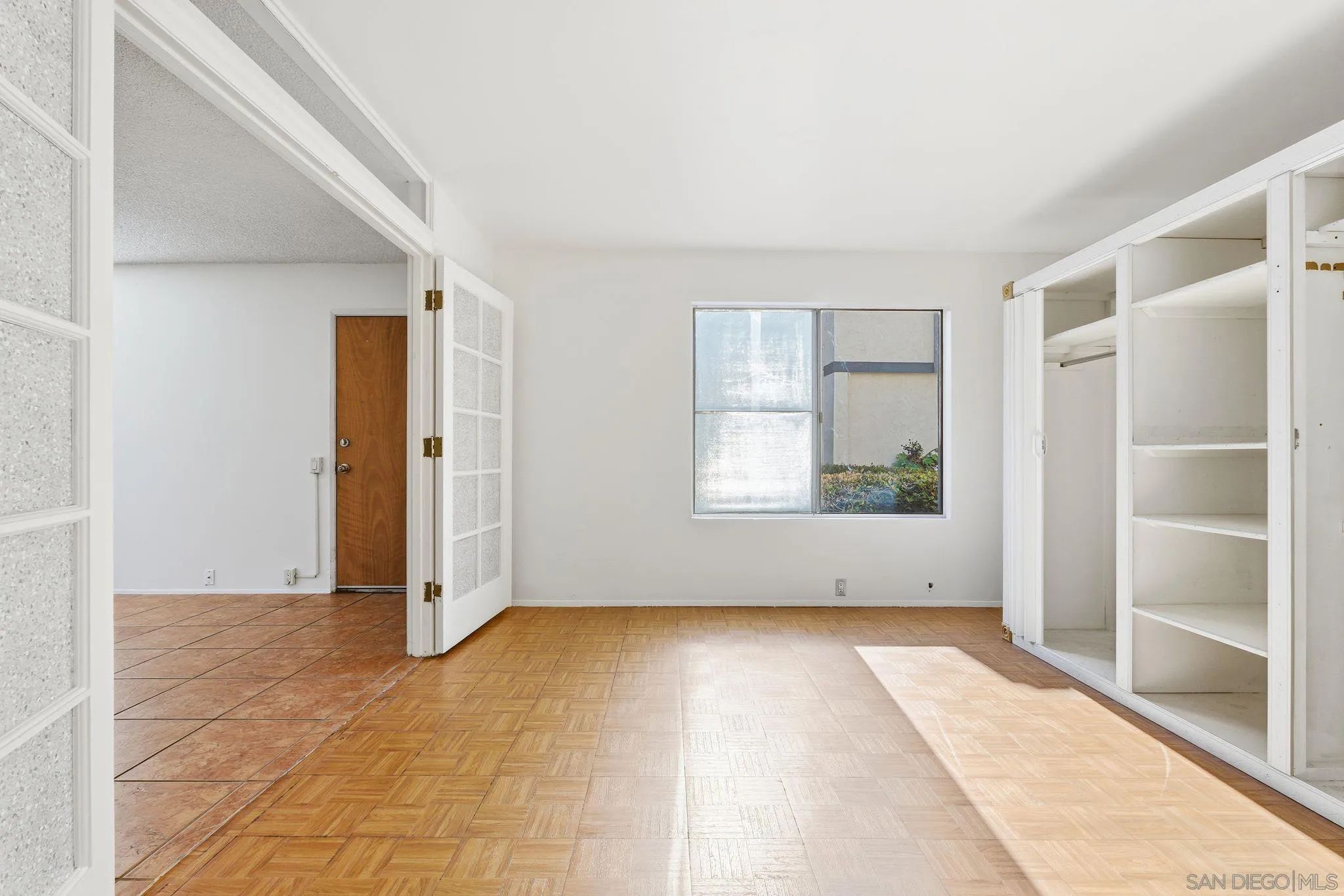 262 Rancho Drive, Unit C Chula Vista, CA 91911 - Photo 5 of 29 an empty room with windows