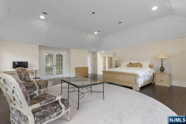 51 Chestnut Ridge Road Saddle River, NJ 07458 - Photo 20 of 45 a bedroom with a bed and wooden floor