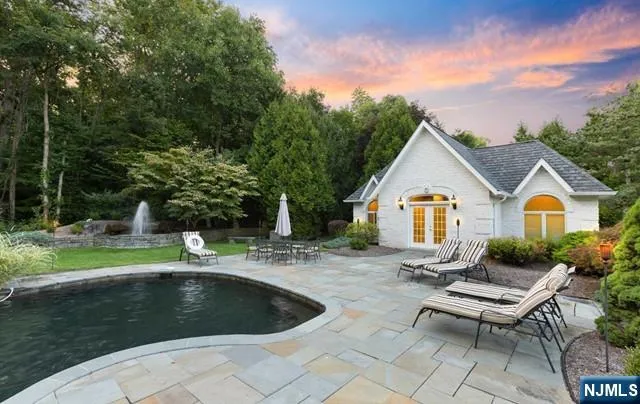 a garden view with a seating space