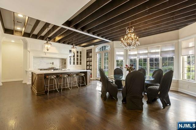 51 Chestnut Ridge Road Saddle River, NJ 07458 - Photo 7 of 45 a view of a dining room with furniture window and wooden floor