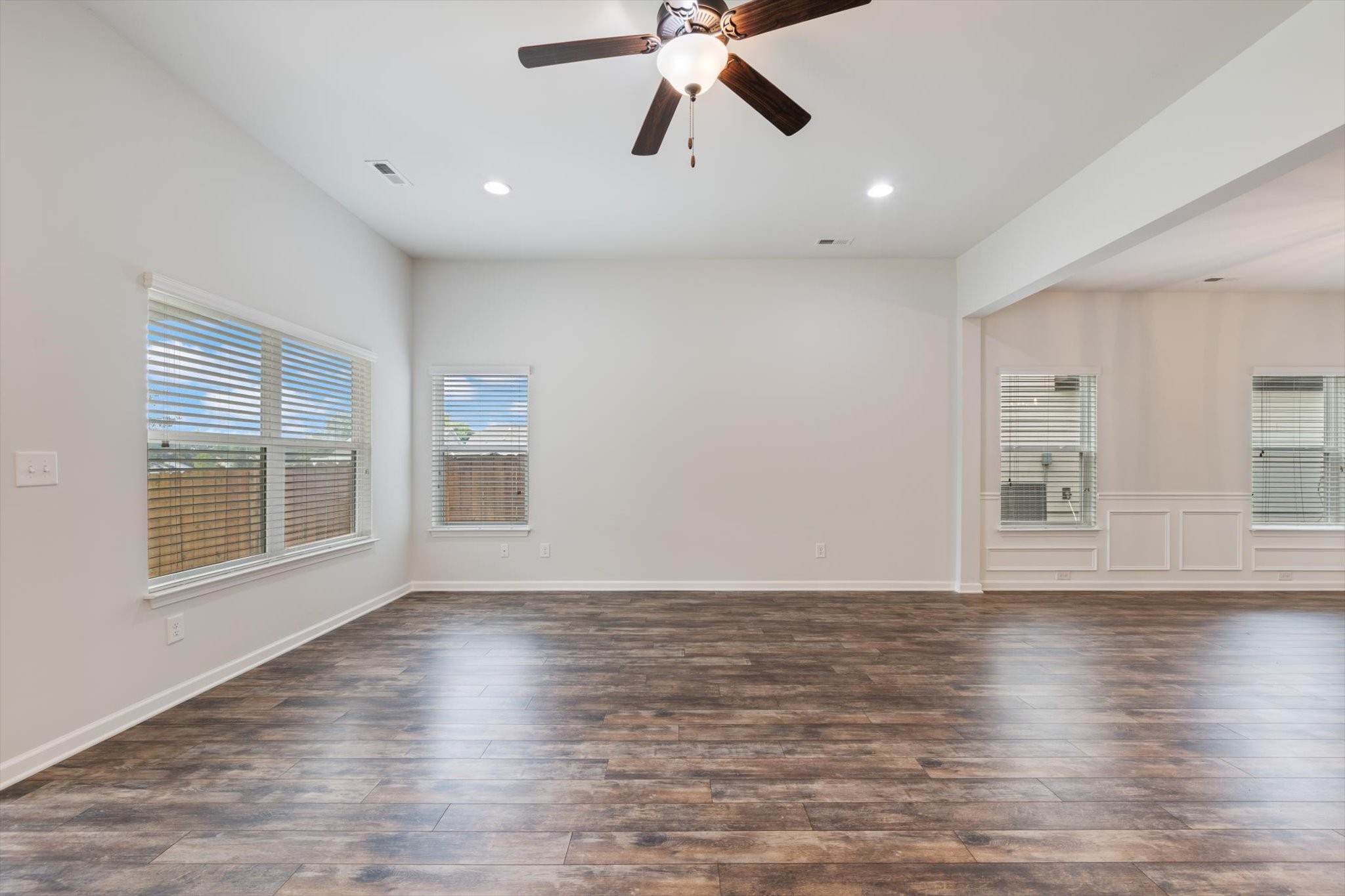 920 Carnation Drive Spring Hill, TN 37174 - Photo 12 of 27 a view of an empty room with wooden floor and a window